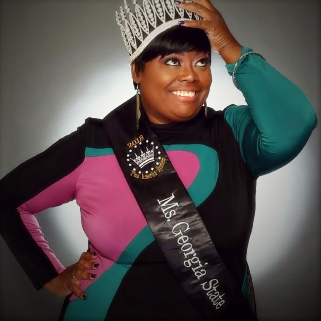 Pageant glam makeup with a crown and sash